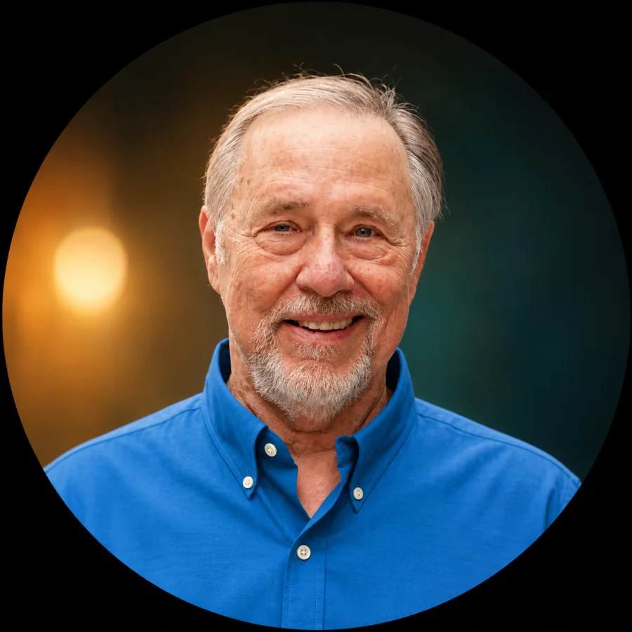 Portrait of Billy Ready smiling in a blue shirt